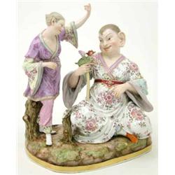 A massive Meissen figure group, Oriental gent. seated wearing kimono, holding small dragon, femal...