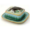 Image 1 : A George Jones majolica sardine dish, cover and stand, modelled with three fish lying against und...