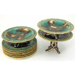 A Wedgwood majolica dessert service, tall comport, two lower comports and six plates mottled in g...