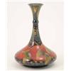 Image 1 : A good Moorcroft Pomegranate vase, with flattened spherical body and tall waisted neck, painted a...