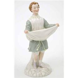 A Victorian Royal Worcester figure, girl wearing green dress and white knickerbockers, holding ap...