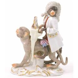 A 19th century Meissen comical monkey group, monkey seated upon the back of another, playing keyb...