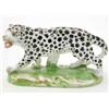 Image 1 : A 19th century porcelain leopard model, painted with black markings, on scroll-moulded oval base,...