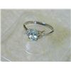Image 1 : RING - OVAL FACETED LIVELY SKY BLUE TOPAZ & 2 DIAMONDS IN STERLING SILVER SOLITAIRE DESIGNED SETTING