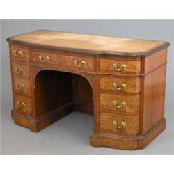 A Maple & Co pollarded oak leather topped pedestal desk, fitted central drawer flanked each side...