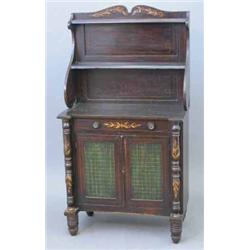 A Regency simulated rosewood chiffonier with shelf back over a frieze drawer and two doors with t...