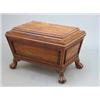 Image 1 : A Regency mahogany sarcophagus shape wine cooler, with moulded panelled sides, on stiff acanthus...