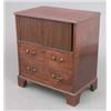 Image 1 : A George III mahogany night commode, with tambour over a dummy drawer fall front on bracket feet,...