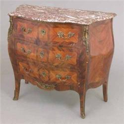 An early 20th century French kingwood bombe commode, with rouge marble top over three drawers, on...