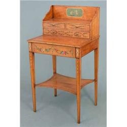 A satinwood Sheraton revival bonheur du jour, with raised superstructure of drawers and frieze dr...