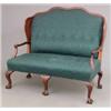 Image 1 : A George III design mahogany frame high back settee, with wavy back, curved sides and floral carv...