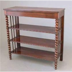 A Regency mahogany buffet, stamped A. Barraud, with concealed frieze drawer over three shelves on...