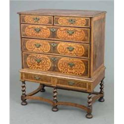 A William and Mary walnut oyster veneered and seaweed marquetry chest, of two short and three lon...