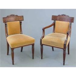 A set of eight George IV mahogany dining chairs, (including two with arms) with curved label cres...