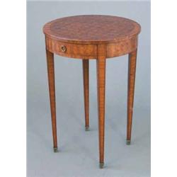 An early 20th century French mahogany circular occasional table, with crossbanded and inlaid top...
