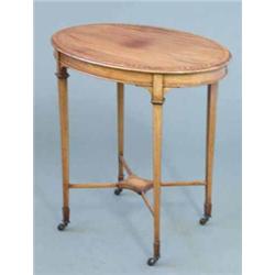 An Edwardian mahogany and satinwood crossbanded oval occasional table, on square tapered legs, 2f...