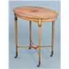 Image 1 : An Edwardian mahogany and satinwood crossbanded oval occasional table, on square tapered legs, 2f...