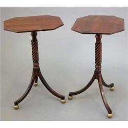 A pair of Regency design mahogany occasional tables, with octagonal tops on spiral fluted columns...