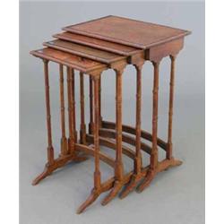 A Victorian oak quartetto nest of tables, on turned legs, 1ft 8ins...