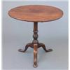 Image 1 : A George III mahogany circular occasional table, on spiral fluted stem and tripod (alterations) 2...