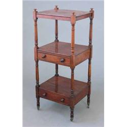 A George IV mahogany 3-tier whatnot, with two drawers, fitted knob handles on turned supports, 1f...