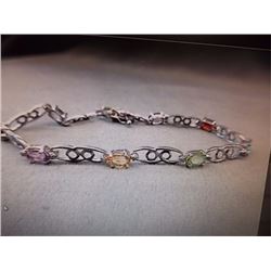 BRACELET - 9 OVAL FACETED MULTI GEMSTONES IN STERLING SILVER DOUBLE INFINITY DESIGNED LINK SETTING -