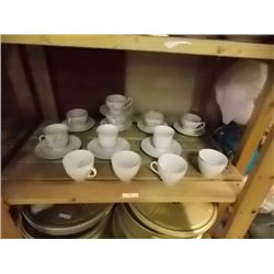 TEA CUPS AND SAUCERS
