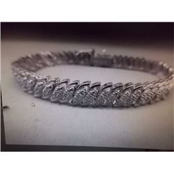 BRACELET - ROUND FACETTED DIAMONDS IN STERLING SILVER S-WAVE DESIGNED SETTING - WITH SAFETY CLASP - 