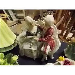 MAN & WOMAN ON COUCH - LAGINO CANADA