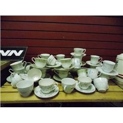 TEA CUPS AND SAUCERS