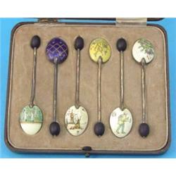 A boxed set of 6 George VI silver gilt coffee spoons, with enamelled bowls...