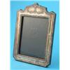 Image 1 : A George V silver photo frame, of shaped rectangular form, decorated with flowers, Chester 1913,...