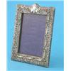 Image 1 : An Edwardian silver photo frame, with pierced flower and scroll decoration, Birmingham 1902, 8ins...