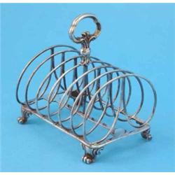 A Victorian silver wirework 6-division toastrack, maker Robert Garrard, 1878, 13oz...