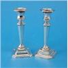 Image 1 : A pair of George V silver candlesticks, of tapered octagonal form, with loaded bases, Sheffield 1...