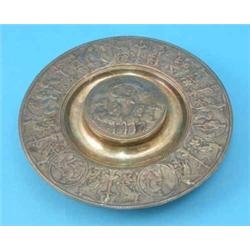 An Elkington & Co plated inkwell, of circular form decorated with classical figures, 7ins...