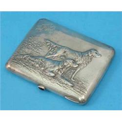 A Russian 84 zolotnik cigarette case decorated with setters in a landscape, 4.25 ins....