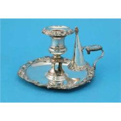 A plated chamberstick with conical extinguisher....