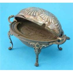 A plated revolving breakfast tureen....