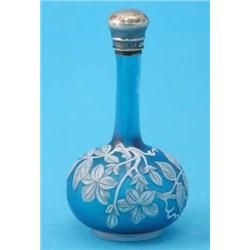 A Victorian silver mounted Webb-style cameo glass scent bottle decorated with white overlaid flow...