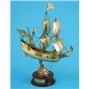Image 1 : A Dutch gilt white metal model of “De Halve Naen” the first Dutch ship to sail to America, on woo...