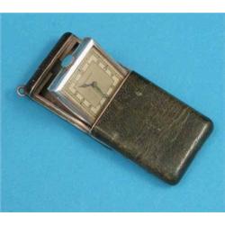 A silver Vertex travelling watch with Arabic dial and green leather case....