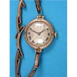 A lady’s 9ct gold Rolex wrist watch with silvered Roman dial and Prima movement....