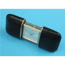 A Mappin black leather covered gilt metal travelling watch....