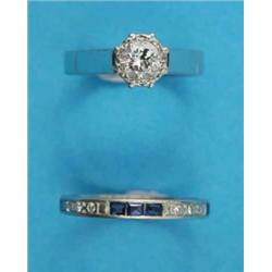 An 18ct white gold and platinum illusion set solitaire diamond ring, together with an eternity ri...