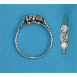 A platinum claw-set 3-stone diamond ring...
