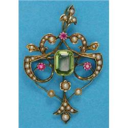 An Edwardian 15ct gold brooch/pendant, of openwork design set with a central rectangular cut peri...