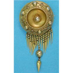 A Victorian gold circular brooch, with wirework decoration, supporting a graduated fringe drop, l...