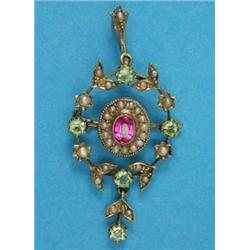 An Edwardian gold pendant/brooch, of openwork design, millegrain set with a central synthetic rub...