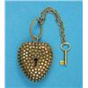 Image 1 : A late 19th century gold heart shape locket, with studded decoration and attached key for the cen...